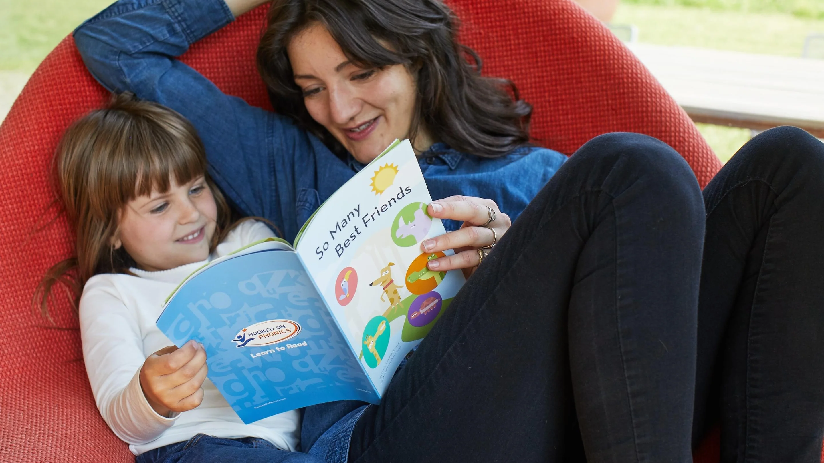 Happy child reading book successfully